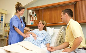 Labor and delivery nurse with patient